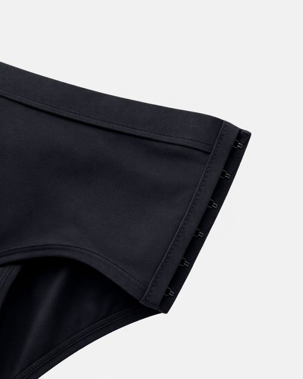 Close-up of the side clasps on Keep it Brief, Brief