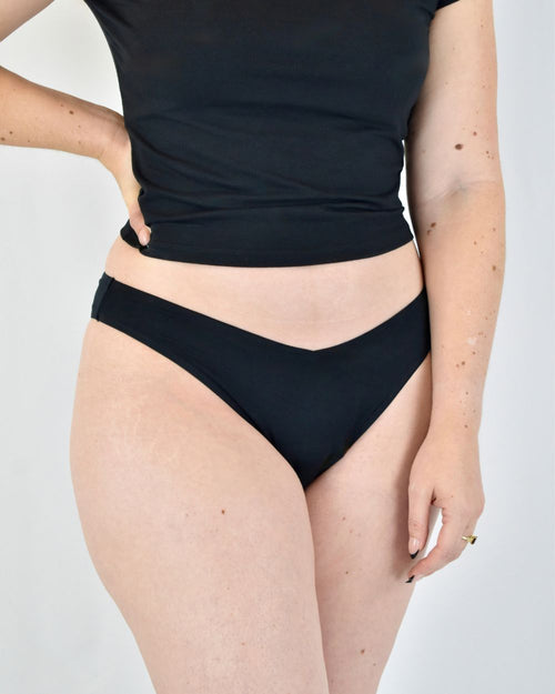 Feelin' Cheeky black Brazilian period underwear, front view worn on model